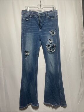 Distressed Mid-Blue Flare Jeans for Women